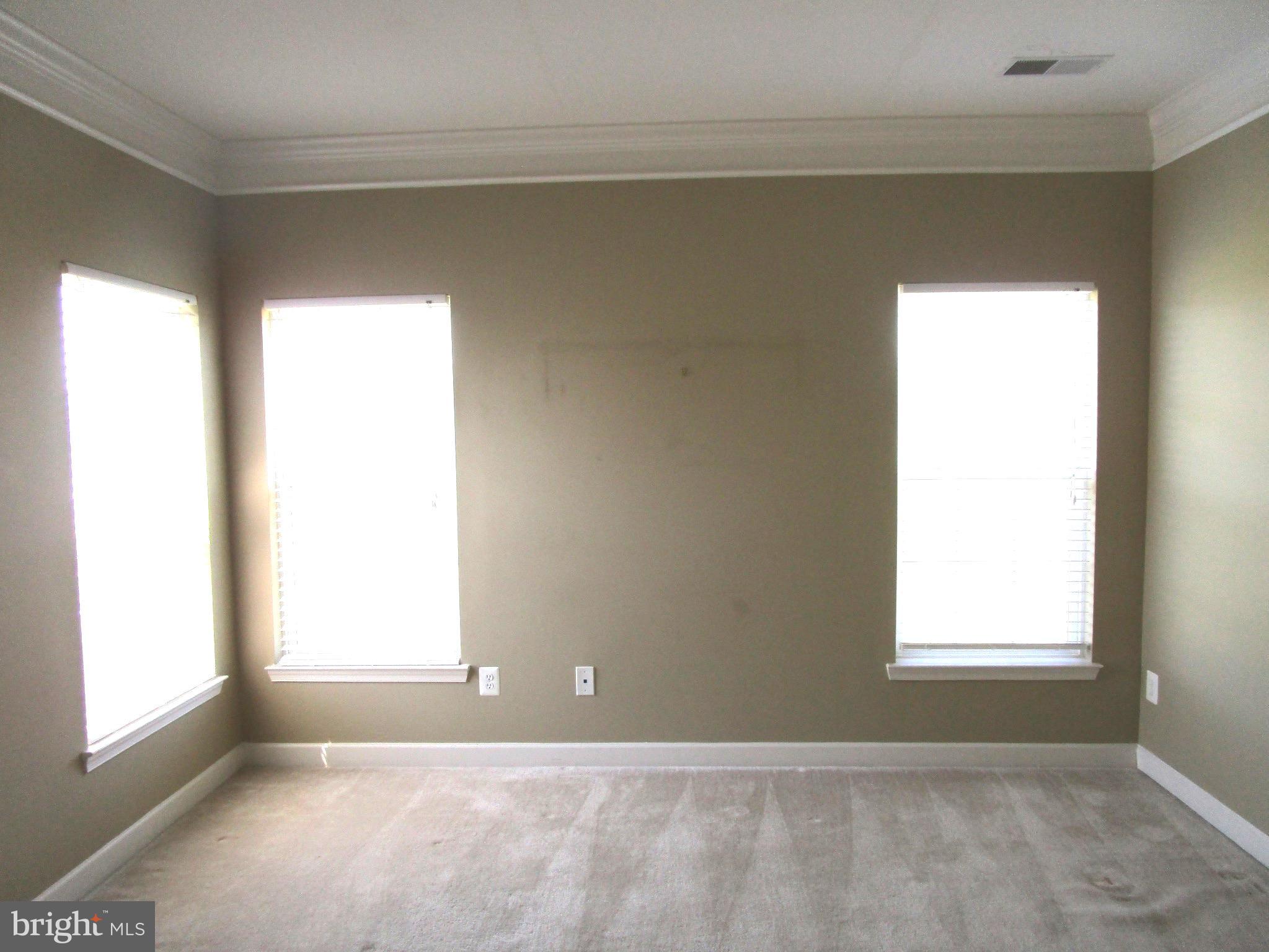 14204 Derby Ridge Road Bowie, MD 20721 - Photo 17 of 27 a view of an empty room and window