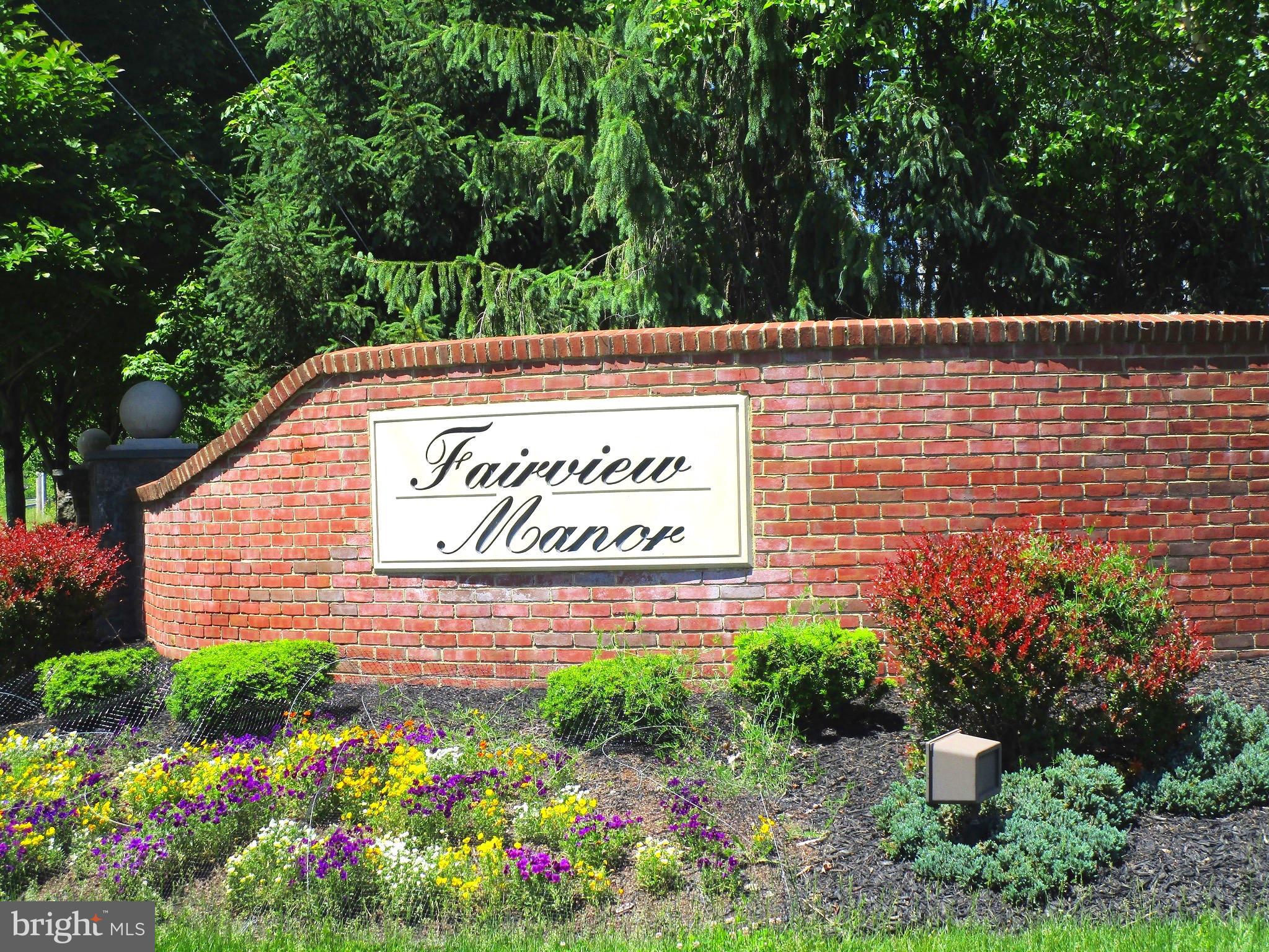 14204 Derby Ridge Road Bowie, MD 20721 - Photo 24 of 27 a sign on the side of a building