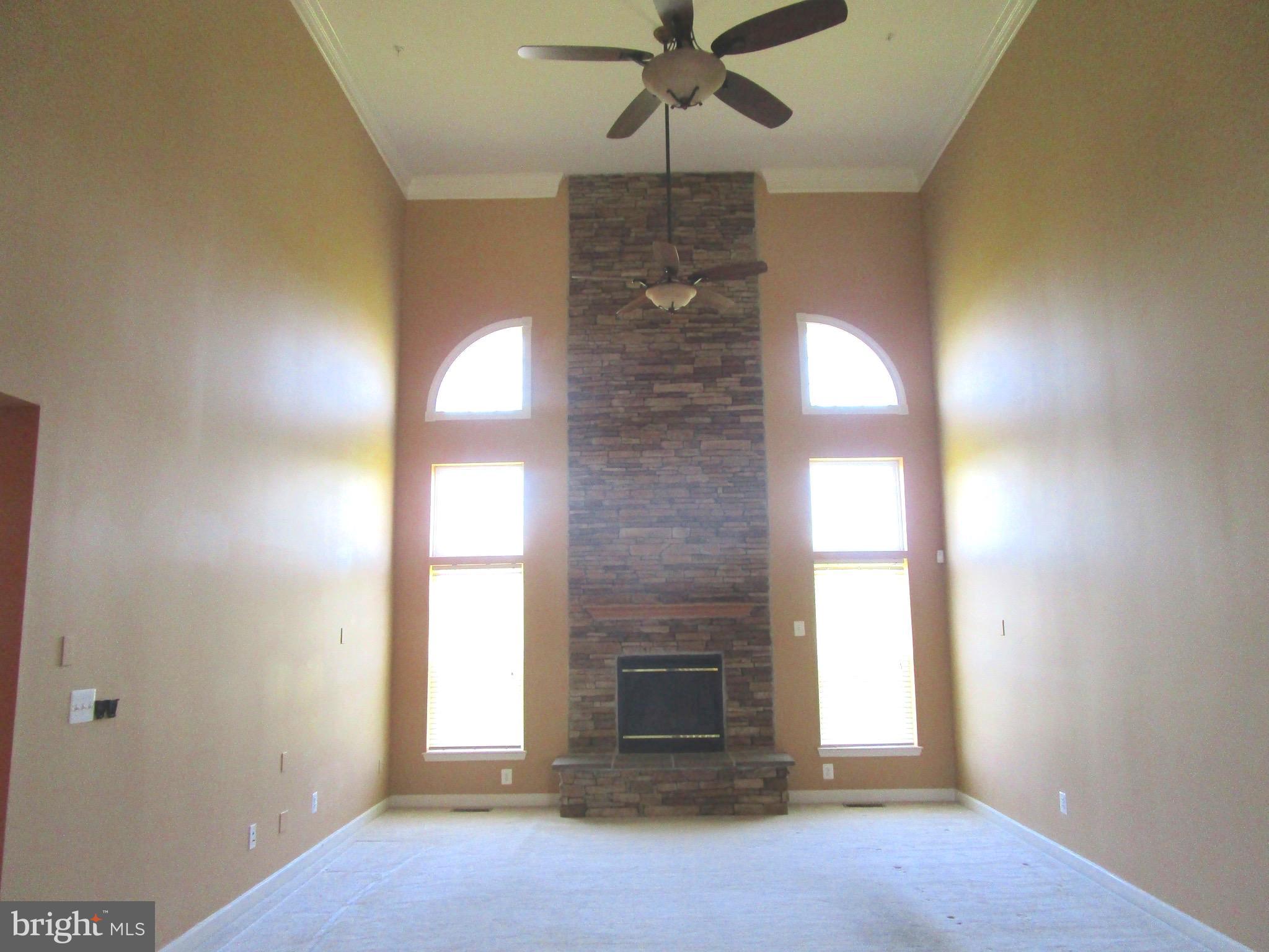 14204 Derby Ridge Road Bowie, MD 20721 - Photo 9 of 27 a view of empty room with a fireplace
