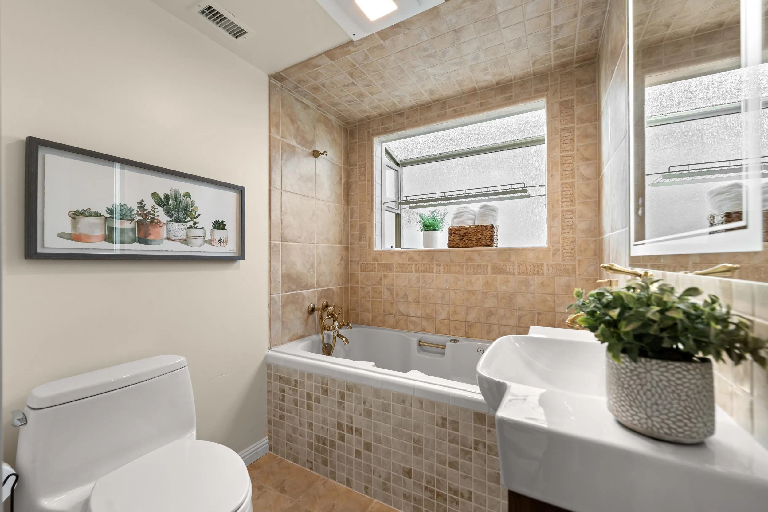 4685 Long Branch Avenue San Diego, CA 92107 - Photo 13 of 27 a bathroom with a toilet and a sink