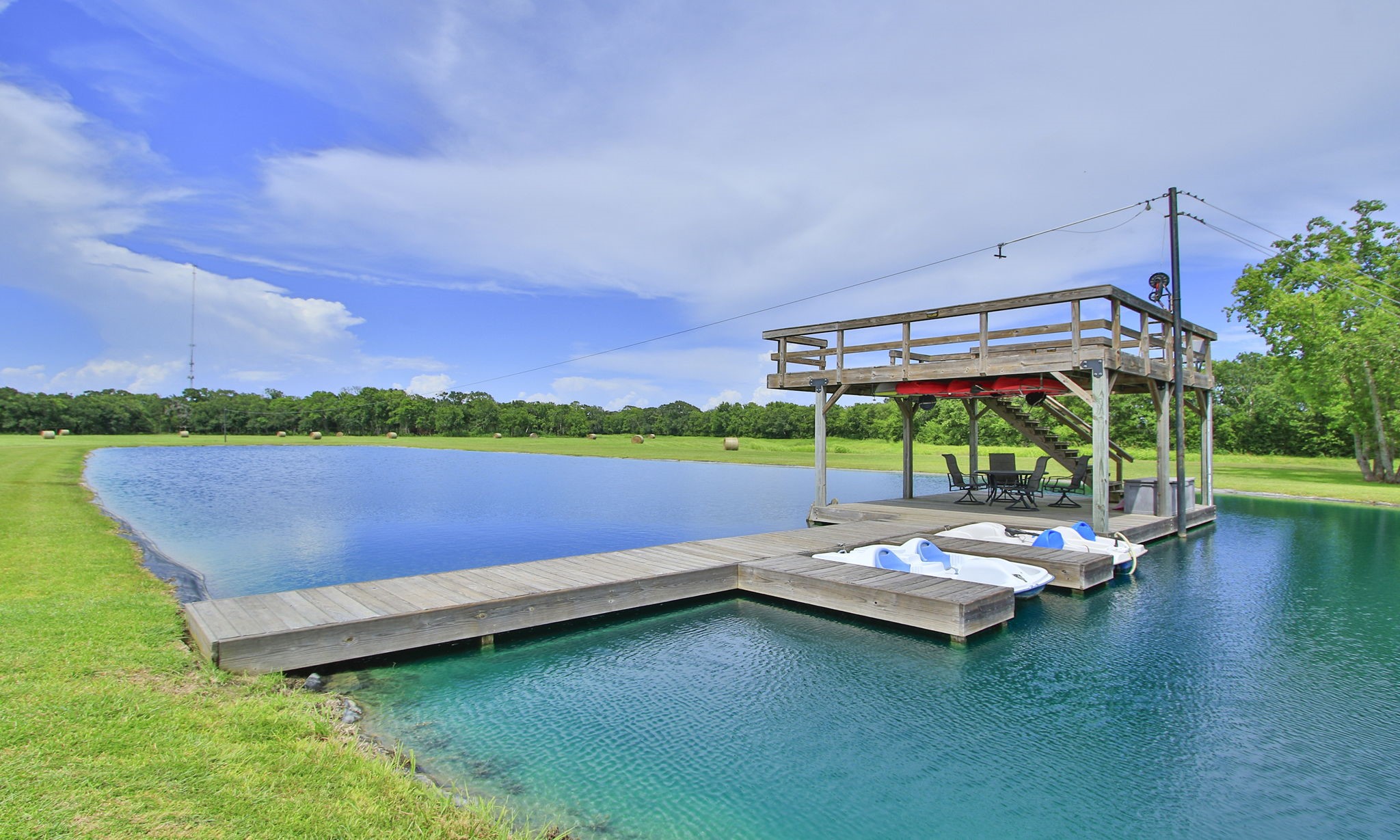 1824 Rymal Road Alvin, TX 77511 - Photo 36 of 39 a view of a lake with a big yard