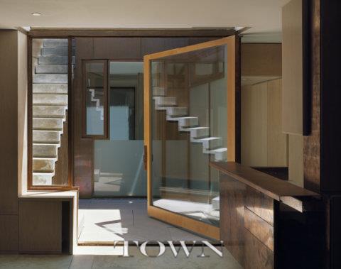 a bathroom with a glass shower door