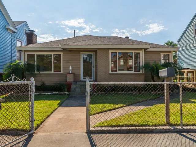 a view of house with swimming pool outdoor seating