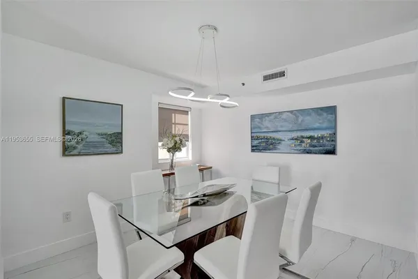 a view of a dining room with furniture