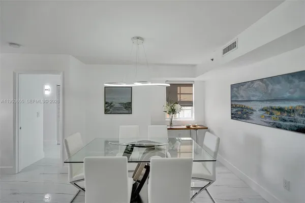 a workspace with furniture and window