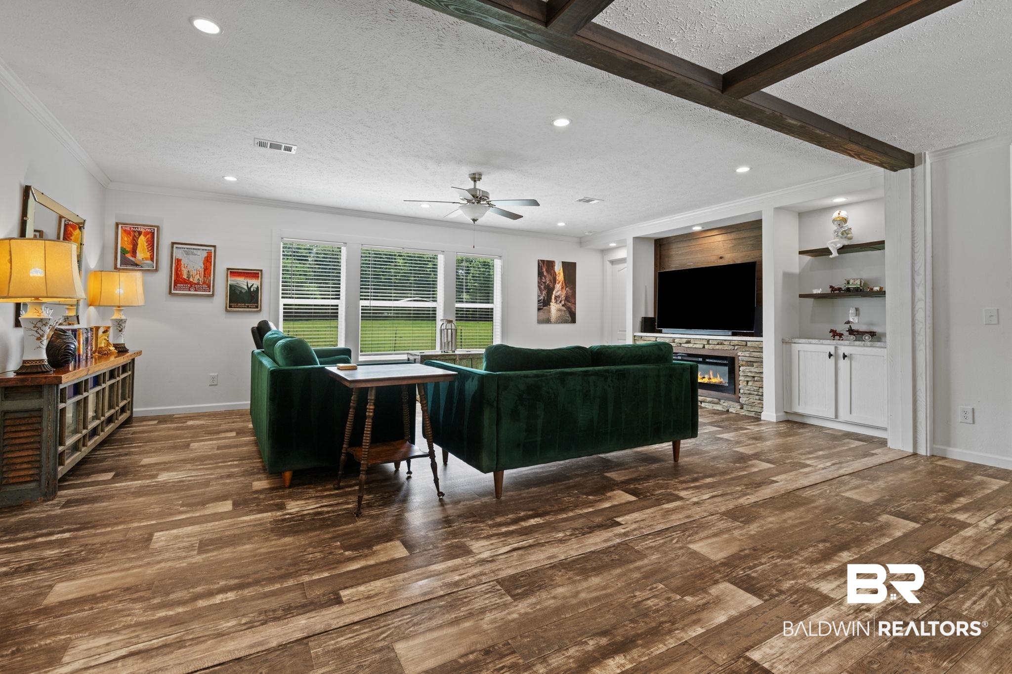 10703 South Ridge Drive Semmes, AL 36575 - Photo 19 of 37 Living room featuring a textured ceiling, wood finished floors, ceiling fan, recessed lighting, and beam ceiling