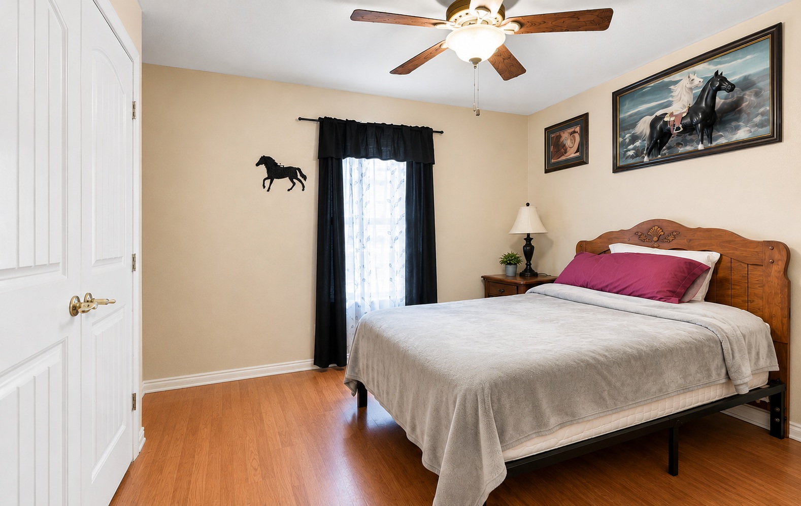 208 West Umstead Colbert, OK 74733 - Photo 20 of 25 Wood-finish flooring, ceiling fan with integrated lighting, and a window with dark drapery