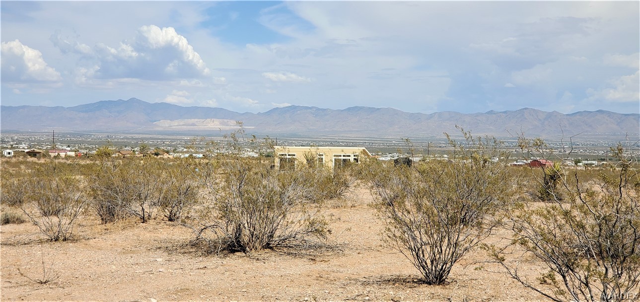 1434 Dilcon Road Golden Valley, AZ 86413 - Photo 11 of 49 a view of lake with mountain