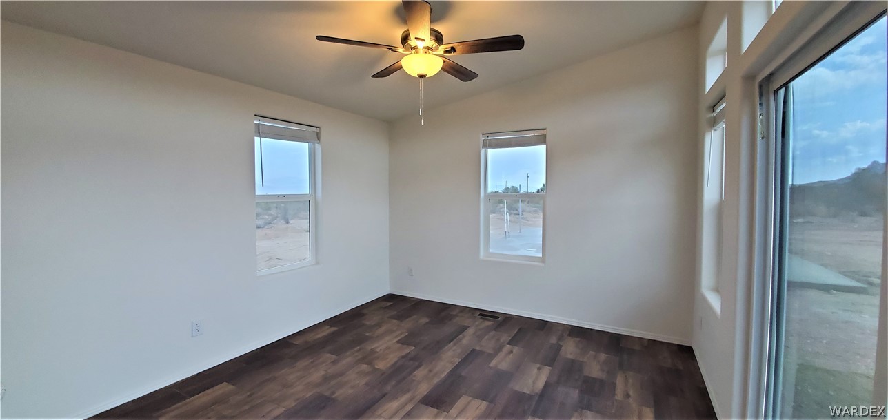 1434 Dilcon Road Golden Valley, AZ 86413 - Photo 13 of 49 a view of an empty room with a window