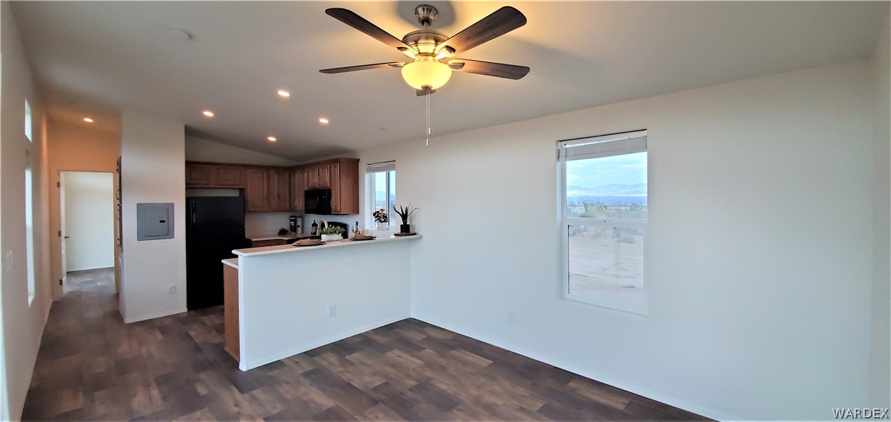 1434 Dilcon Road Golden Valley, AZ 86413 - Photo 16 of 49 a kitchen with stainless steel appliances granite countertop a refrigerator and a sink