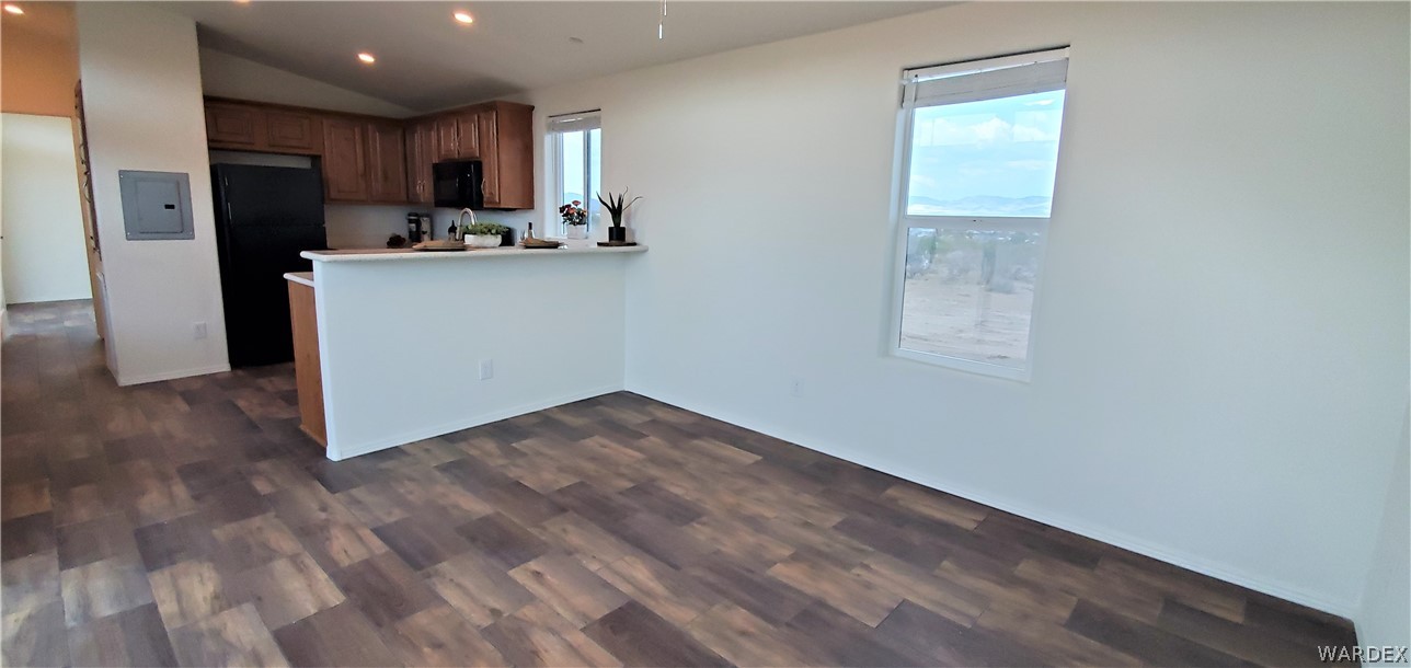 1434 Dilcon Road Golden Valley, AZ 86413 - Photo 17 of 49 a view of kitchen with wooden floor and electronic appliances