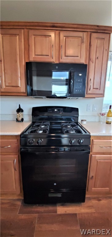1434 Dilcon Road Golden Valley, AZ 86413 - Photo 25 of 49 a stove top oven sitting inside of a kitchen
