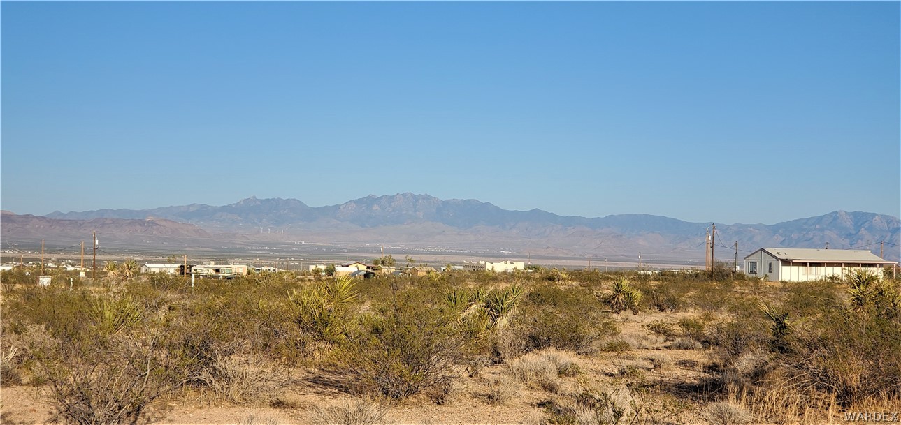 1434 Dilcon Road Golden Valley, AZ 86413 - Photo 48 of 49 a view of an lake and mountain
