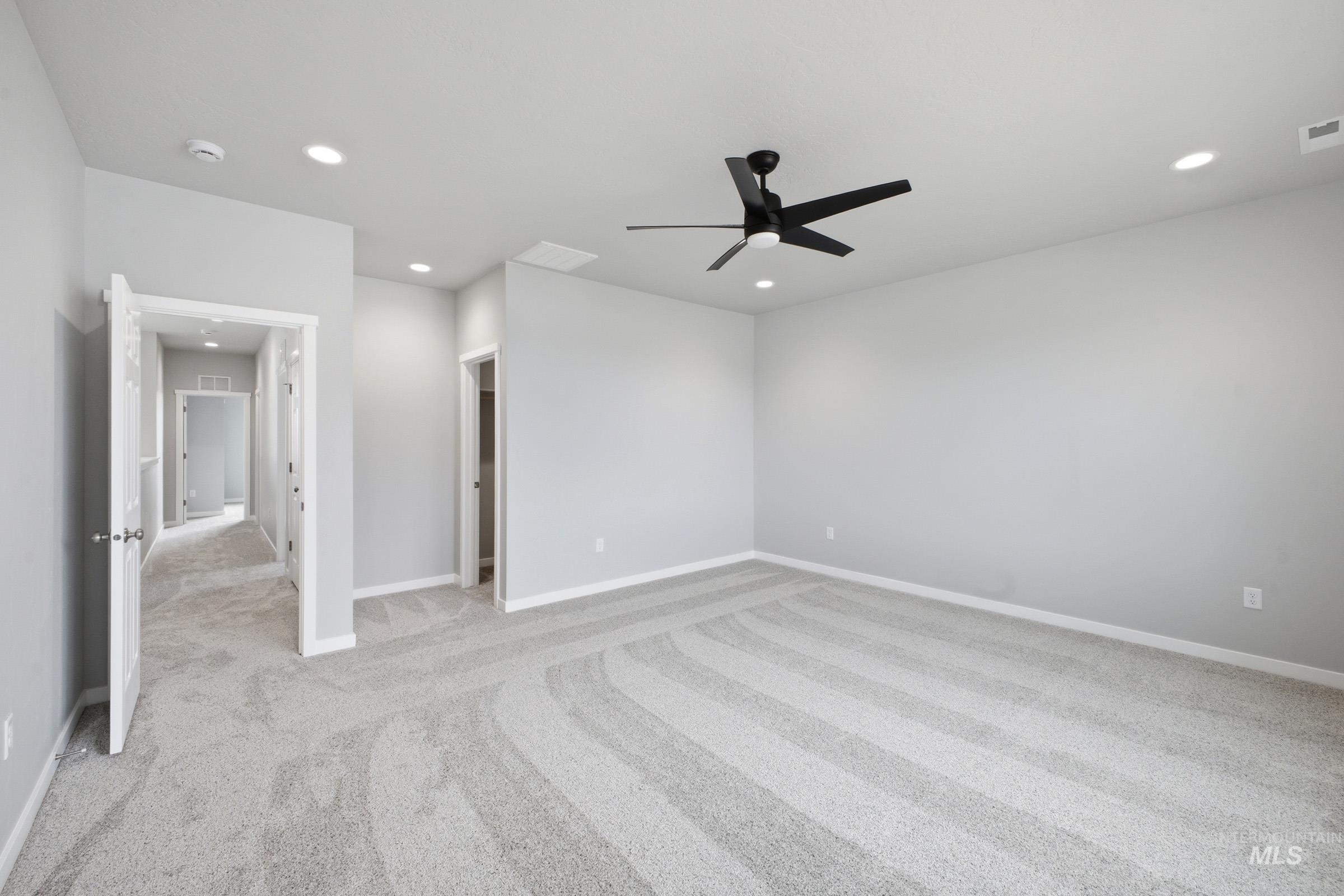 13672 Redway Court Caldwell, ID 83607 - Photo 28 of 34 Unfurnished bedroom featuring light colored carpet, a ceiling fan, and recessed lighting