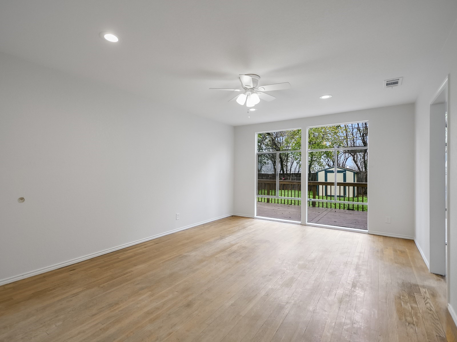 112 East Skyview Road Austin, TX 78752 - Photo 3 of 10 a view of an empty room with glass door