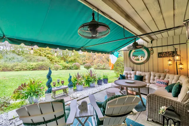 a outdoor space with furniture and garden view