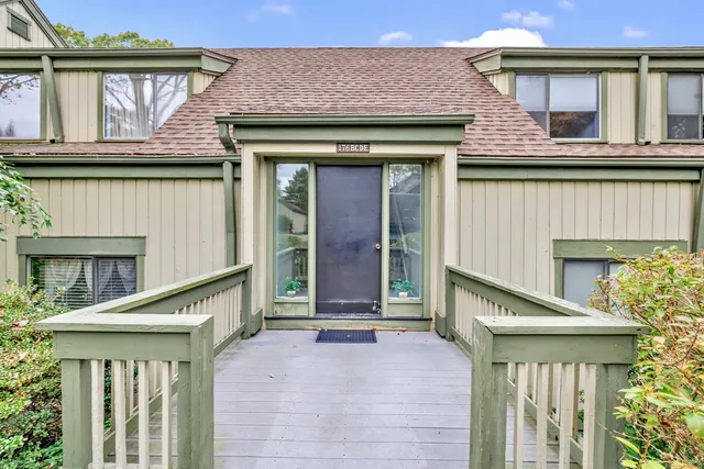 a front view of a house with a porch