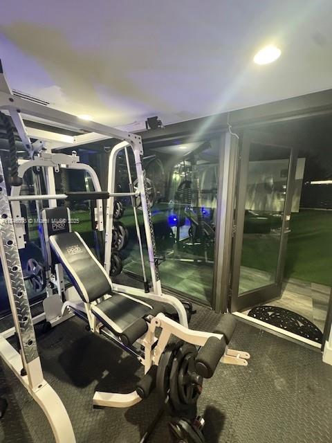 4229 West 7th Lane Hialeah, FL 33012 - Photo 2 of 6 a room with gym equipment