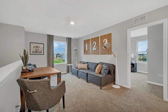 a living room with furniture and window