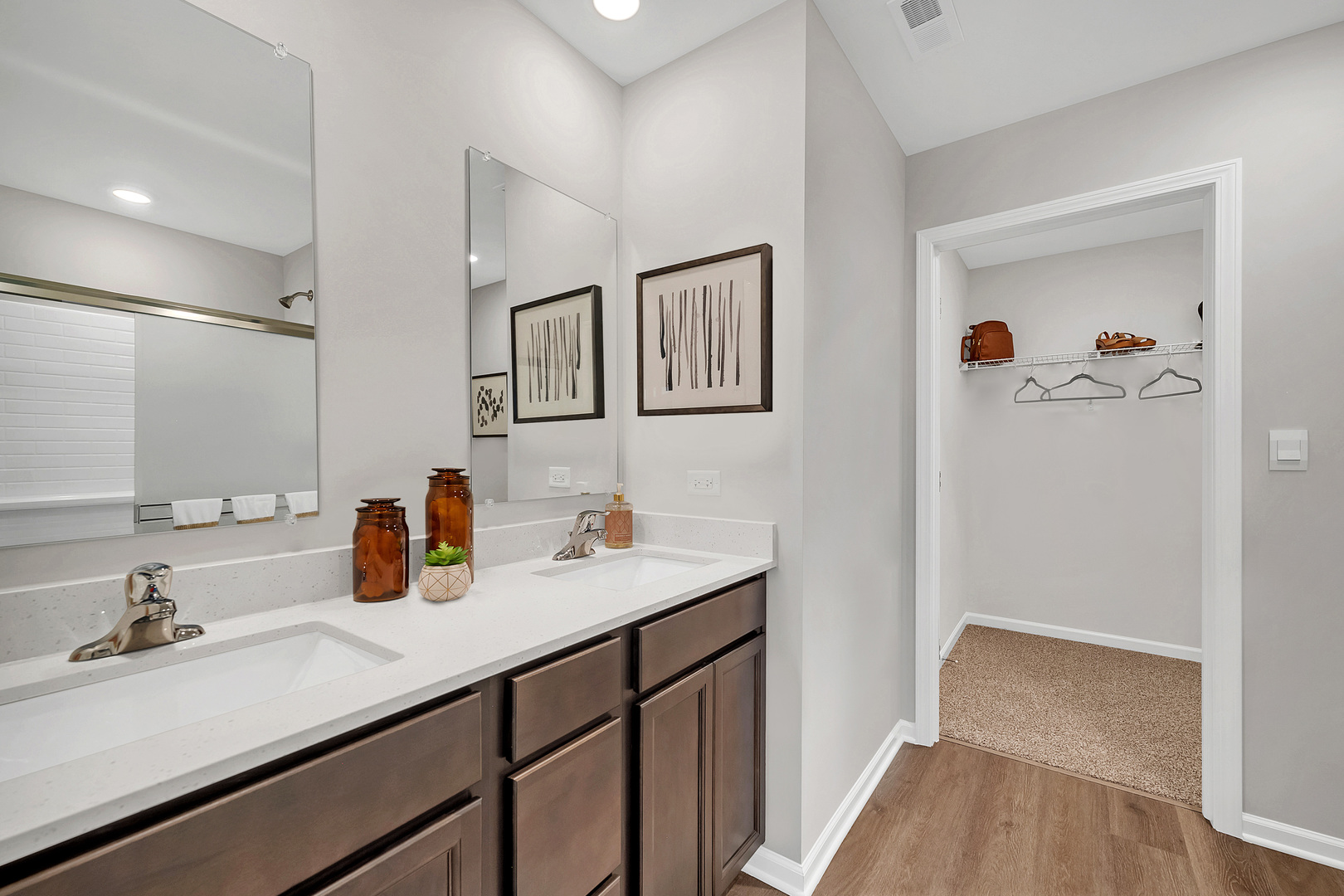 516 Adirondack Court Joliet, IL 60421 - Photo 14 of 17 a bathroom with a sink and a mirror