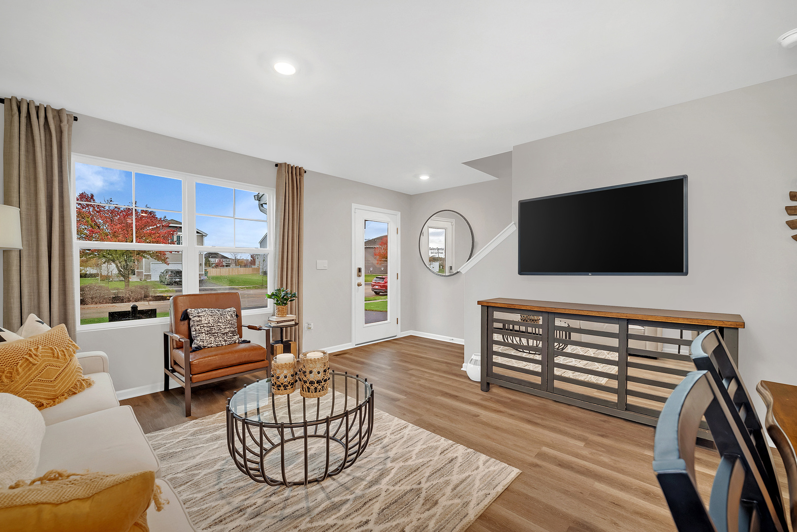 516 Adirondack Court Joliet, IL 60421 - Photo 2 of 17 a living room with furniture and a flat screen tv