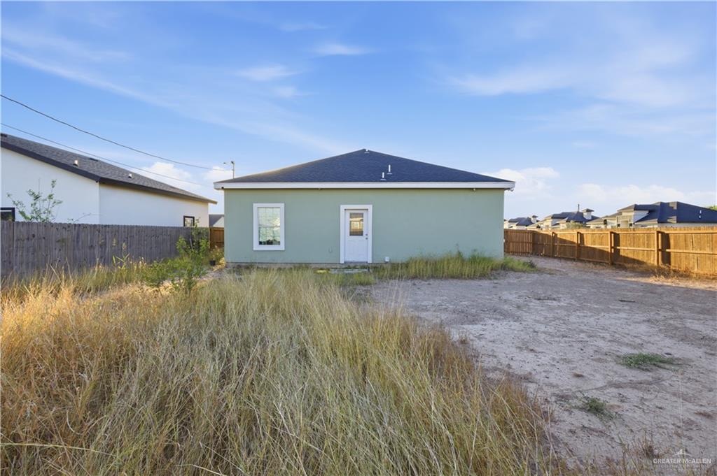 804 Hawk Street Alamo, TX 78516 - Photo 14 of 14 a view of a back yard of the house