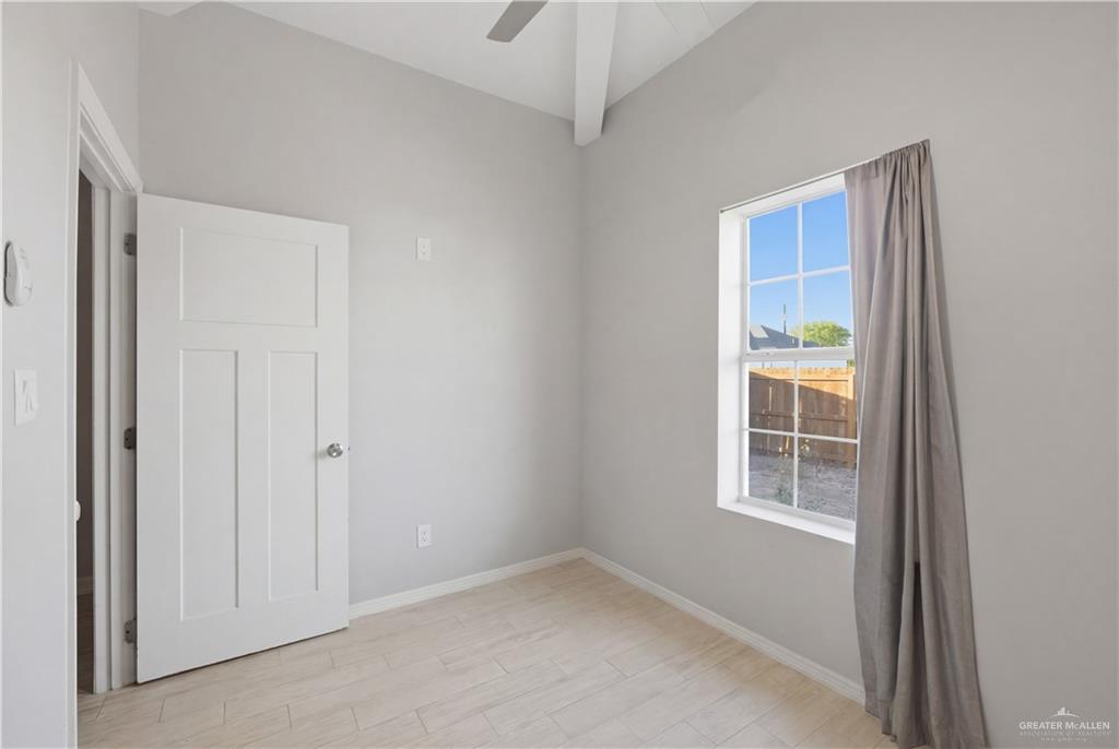 804 Hawk Street Alamo, TX 78516 - Photo 9 of 14 an empty room with windows