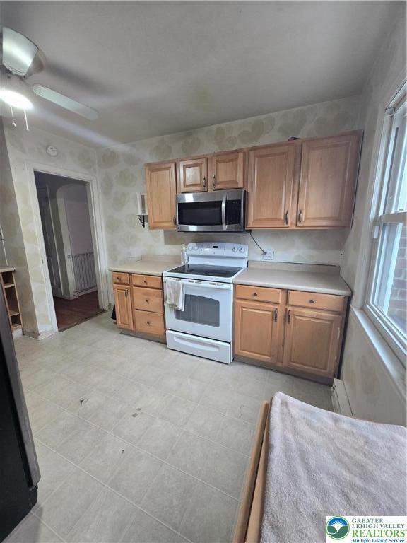 2236 Lincoln Street Bethlehem, PA 18017 - Photo 6 of 29 a kitchen with stainless steel appliances granite countertop a stove a sink and a refrigerator