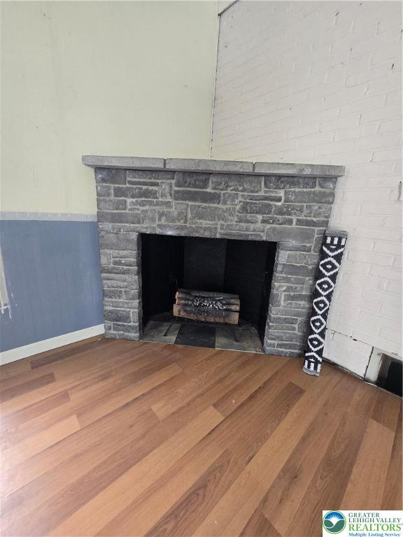 2236 Lincoln Street Bethlehem, PA 18017 - Photo 10 of 29 a view of empty room with fireplace and wooden floor