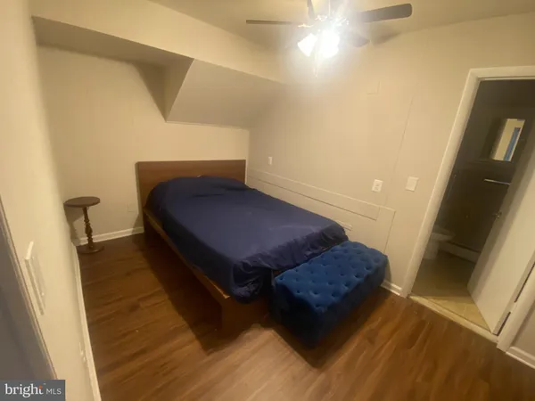 a living room with a couch and a flat screen tv