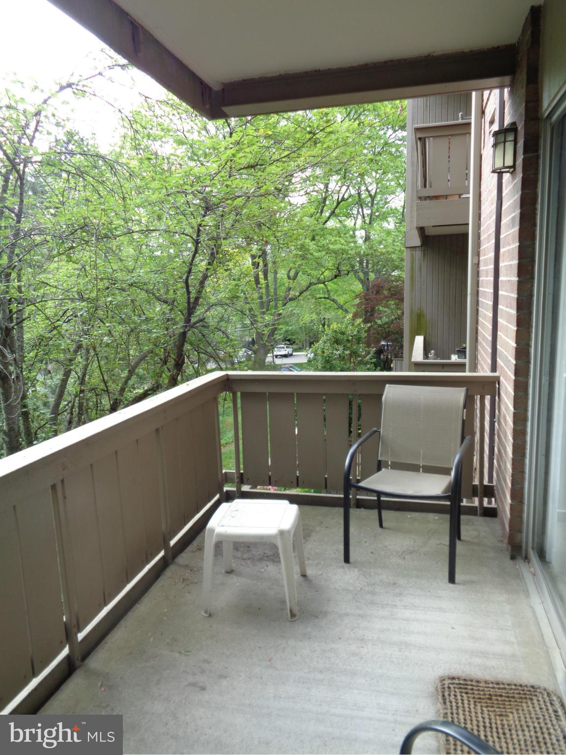 114 Cross Keys Road, Unit R114D Baltimore, MD 21210 - Photo 15 of 22 a view of a two chair in the balcony