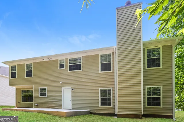 a front view of a house with a garage