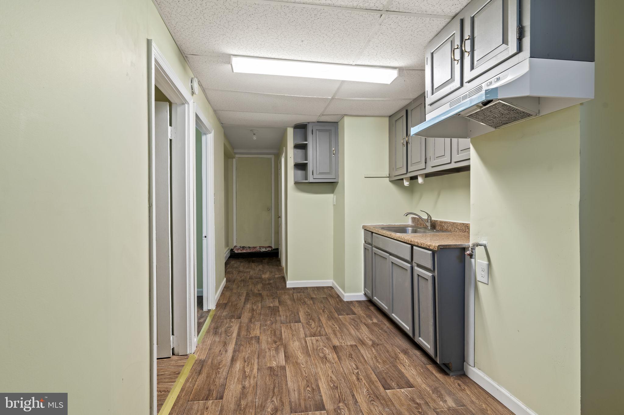 2810 Panther Road Vineland, NJ 08361 - Photo 12 of 20 a kitchen with granite countertop a sink and a stove top oven