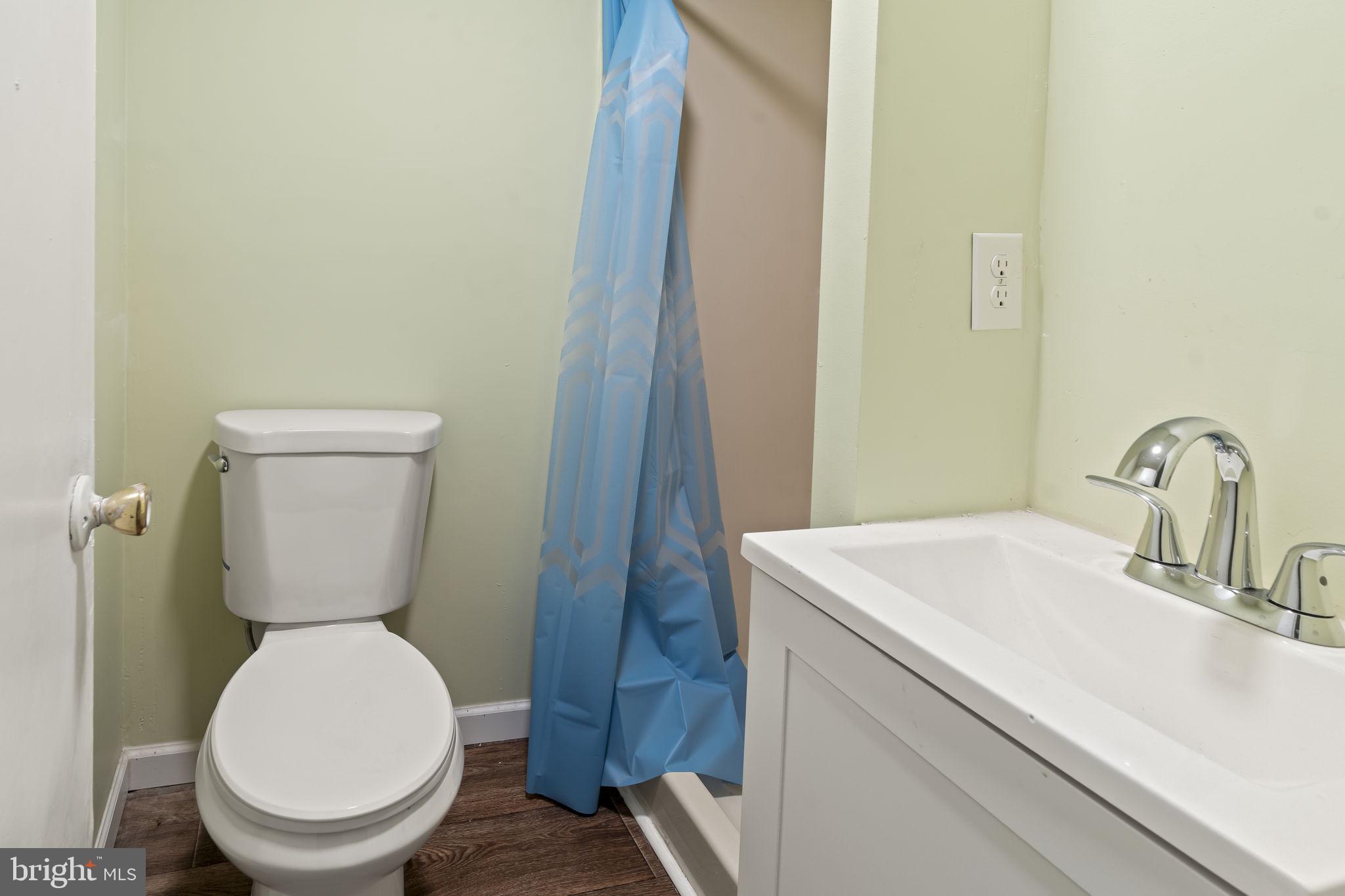 2810 Panther Road Vineland, NJ 08361 - Photo 15 of 20 a bathroom with a toilet sink and mirror