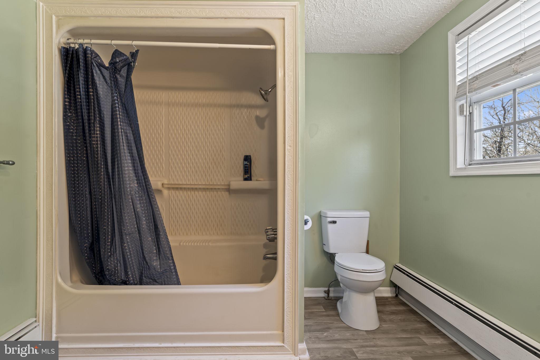 2810 Panther Road Vineland, NJ 08361 - Photo 16 of 20 a bathroom with a toilet and a shower