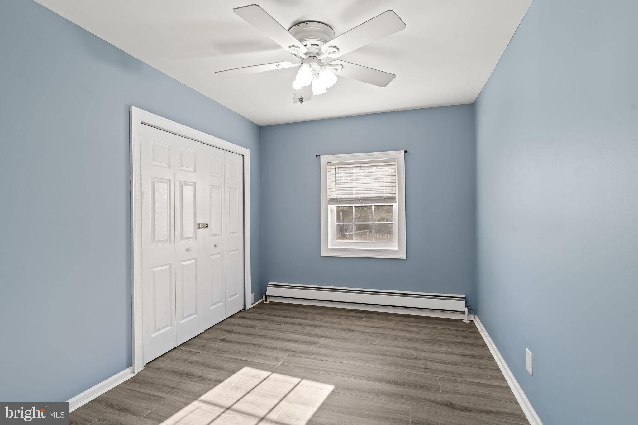 2810 Panther Road Vineland, NJ 08361 - Photo 7 of 20 an empty room with windows and fan