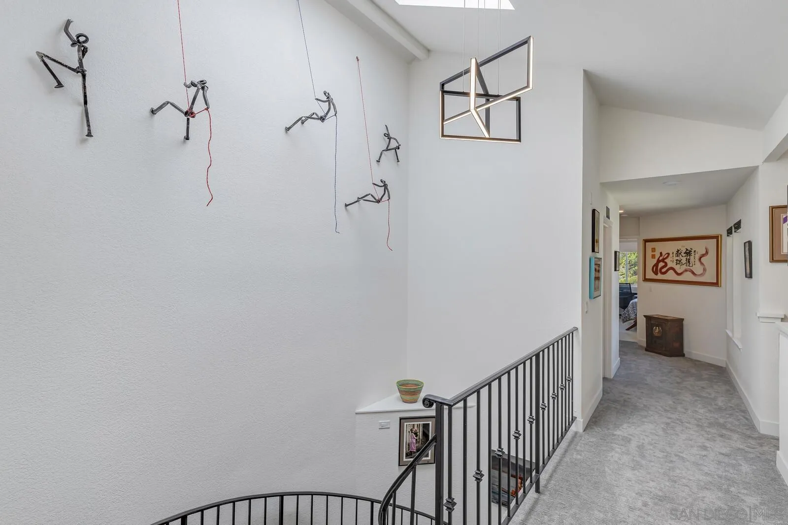 14921 Tercer Verde Del Mar, CA 92014 - Photo 14 of 37 a view of a hallway with a white walls