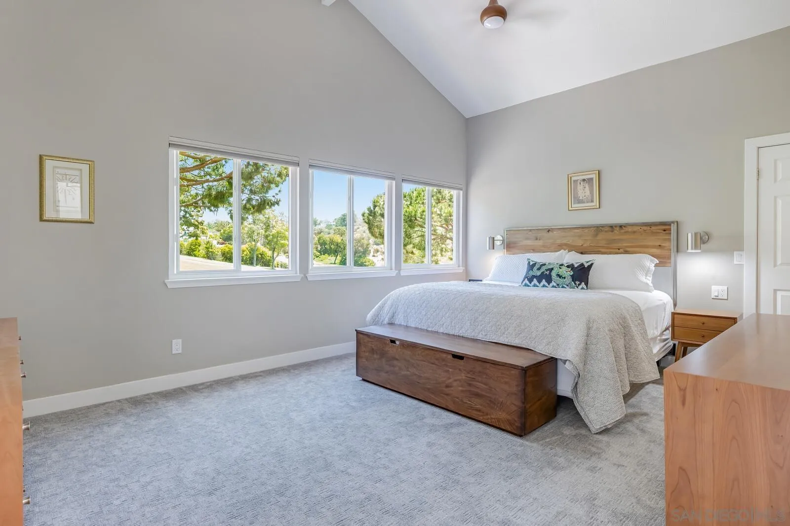 14921 Tercer Verde Del Mar, CA 92014 - Photo 15 of 37 a bed sitting in a bedroom next to a window