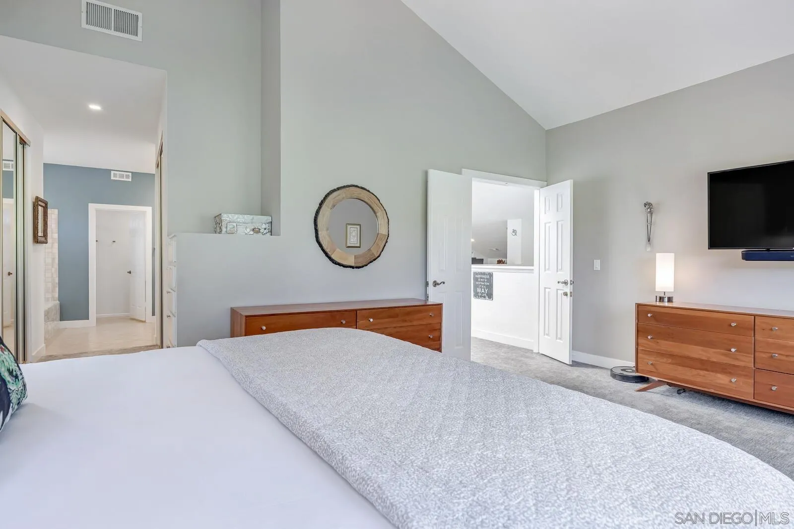 14921 Tercer Verde Del Mar, CA 92014 - Photo 17 of 37 a bedroom with a bed and a television