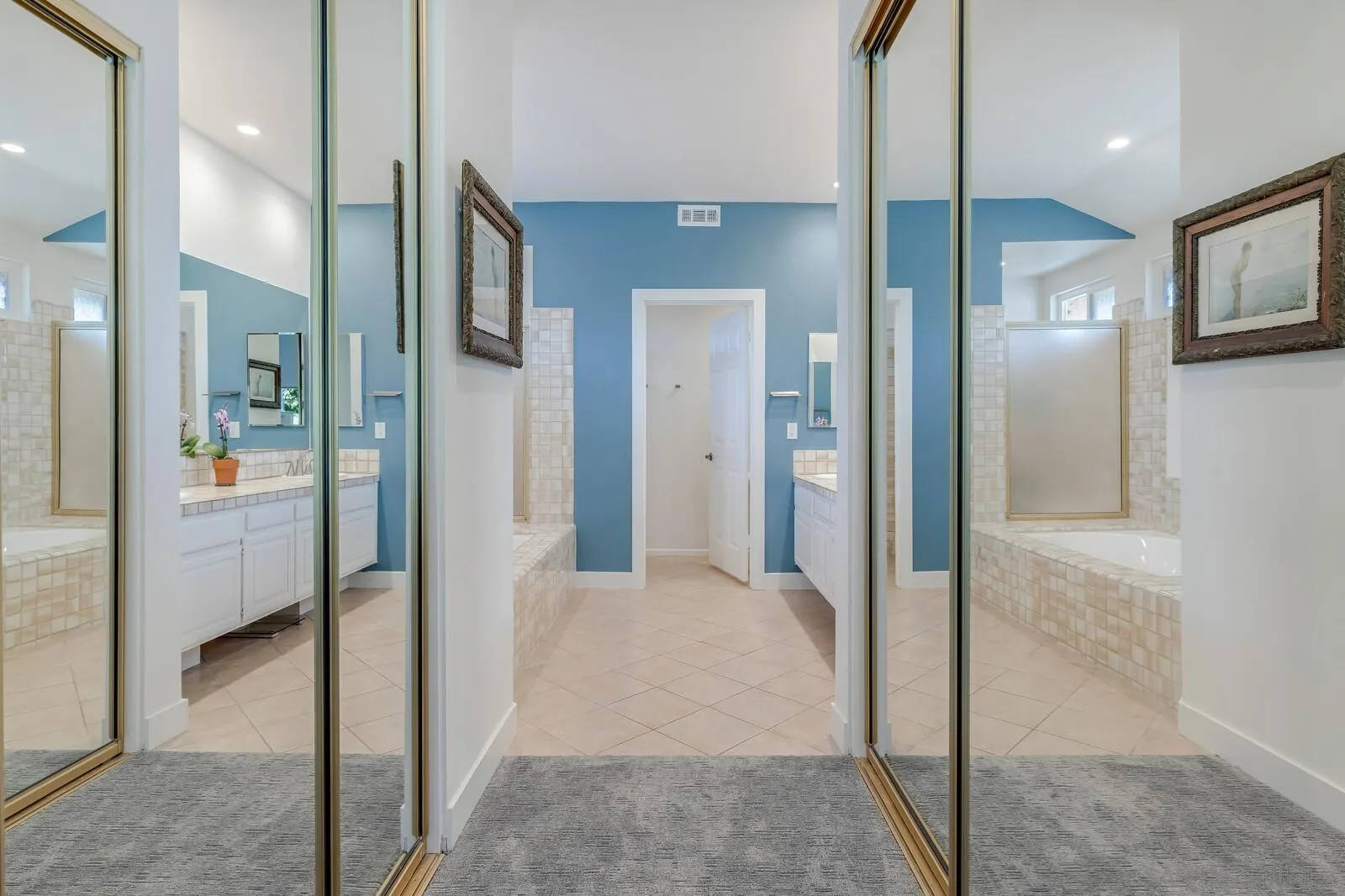 14921 Tercer Verde Del Mar, CA 92014 - Photo 19 of 37 a view of a hallway with a livingroom and a bathroom