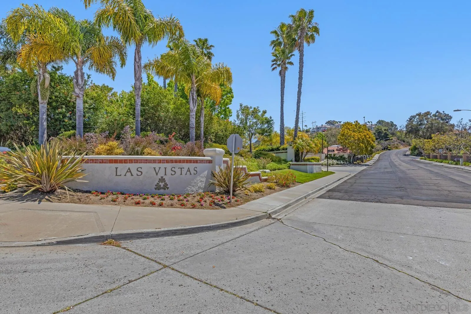 14921 Tercer Verde Del Mar, CA 92014 - Photo 2 of 37 a view of a house with a yard and palm trees