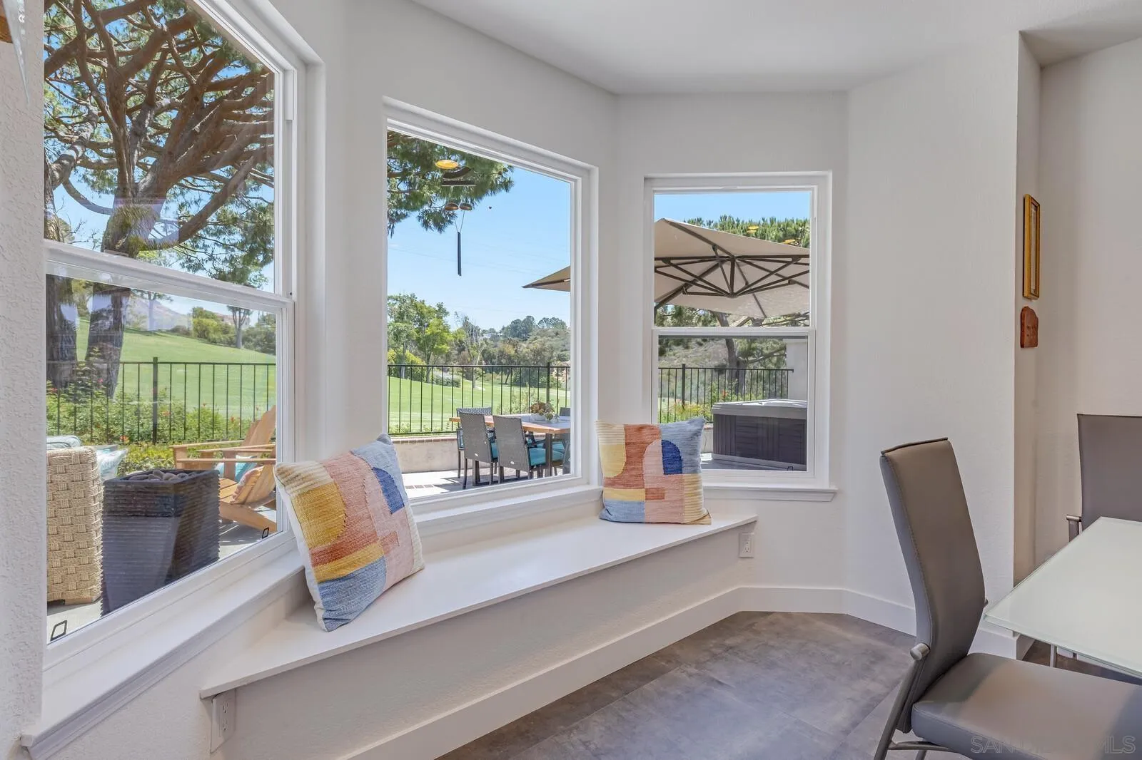 14921 Tercer Verde Del Mar, CA 92014 - Photo 5 of 37 a dining room with wooden floor and windows