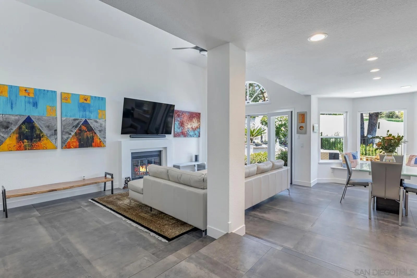 14921 Tercer Verde Del Mar, CA 92014 - Photo 7 of 37 a living room with furniture and a flat screen tv