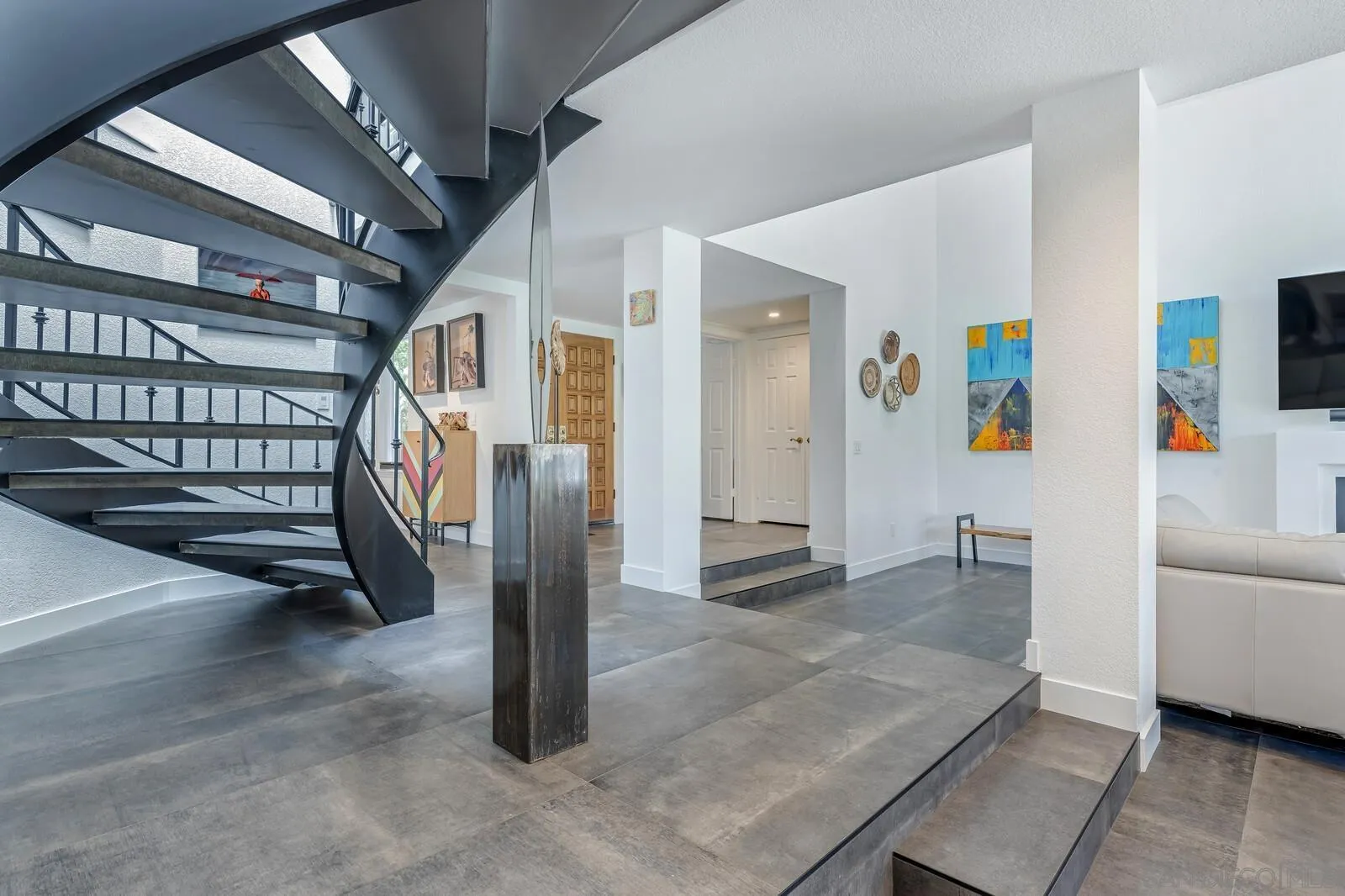 14921 Tercer Verde Del Mar, CA 92014 - Photo 8 of 37 a view of a hallway with a livingroom with furniture