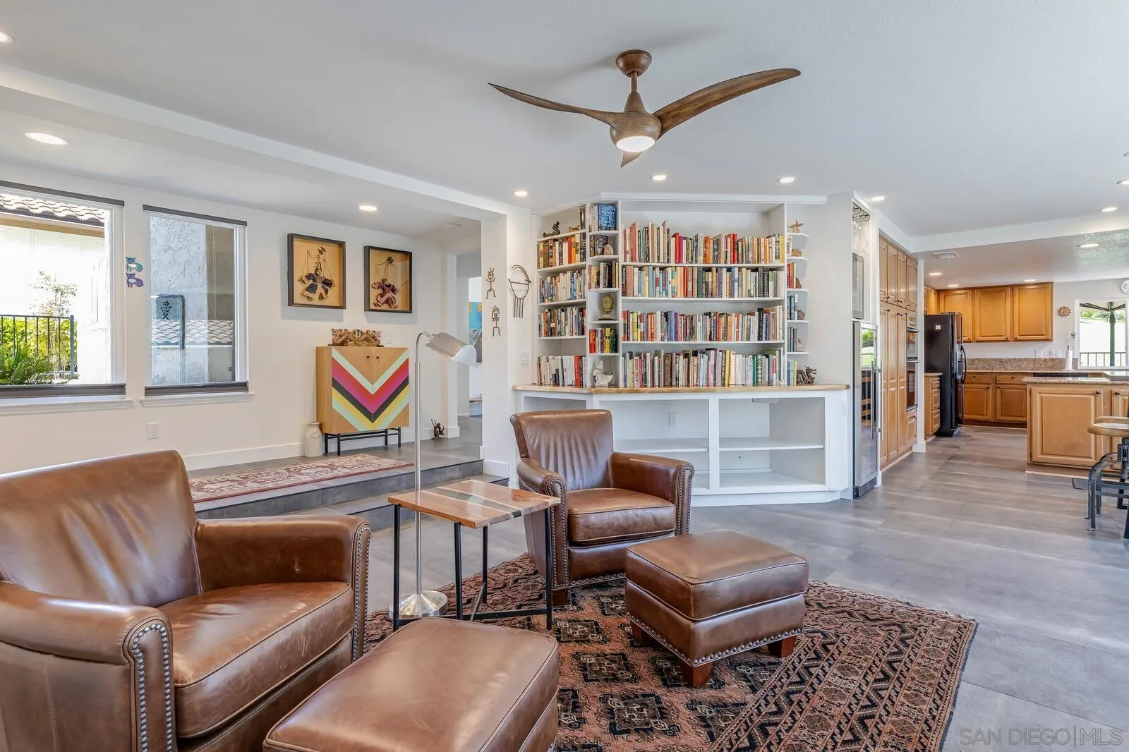 14921 Tercer Verde Del Mar, CA 92014 - Photo 10 of 37 a living room with furniture a rug and a window
