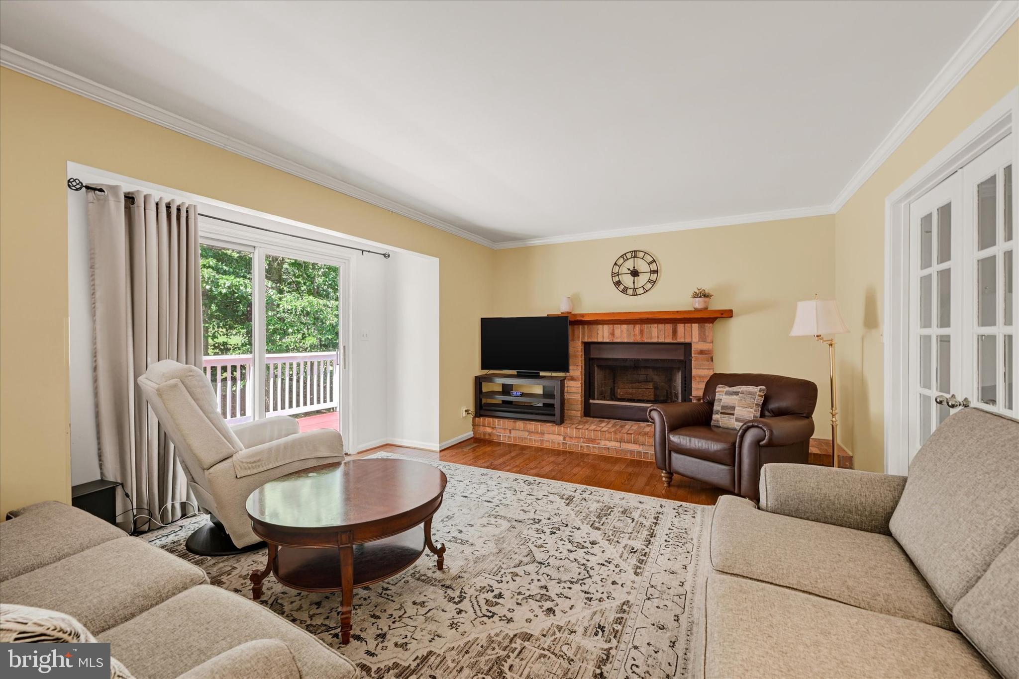 9006 Naygall Road Baltimore, MD 21234 - Photo 15 of 34 a living room with furniture and a fireplace