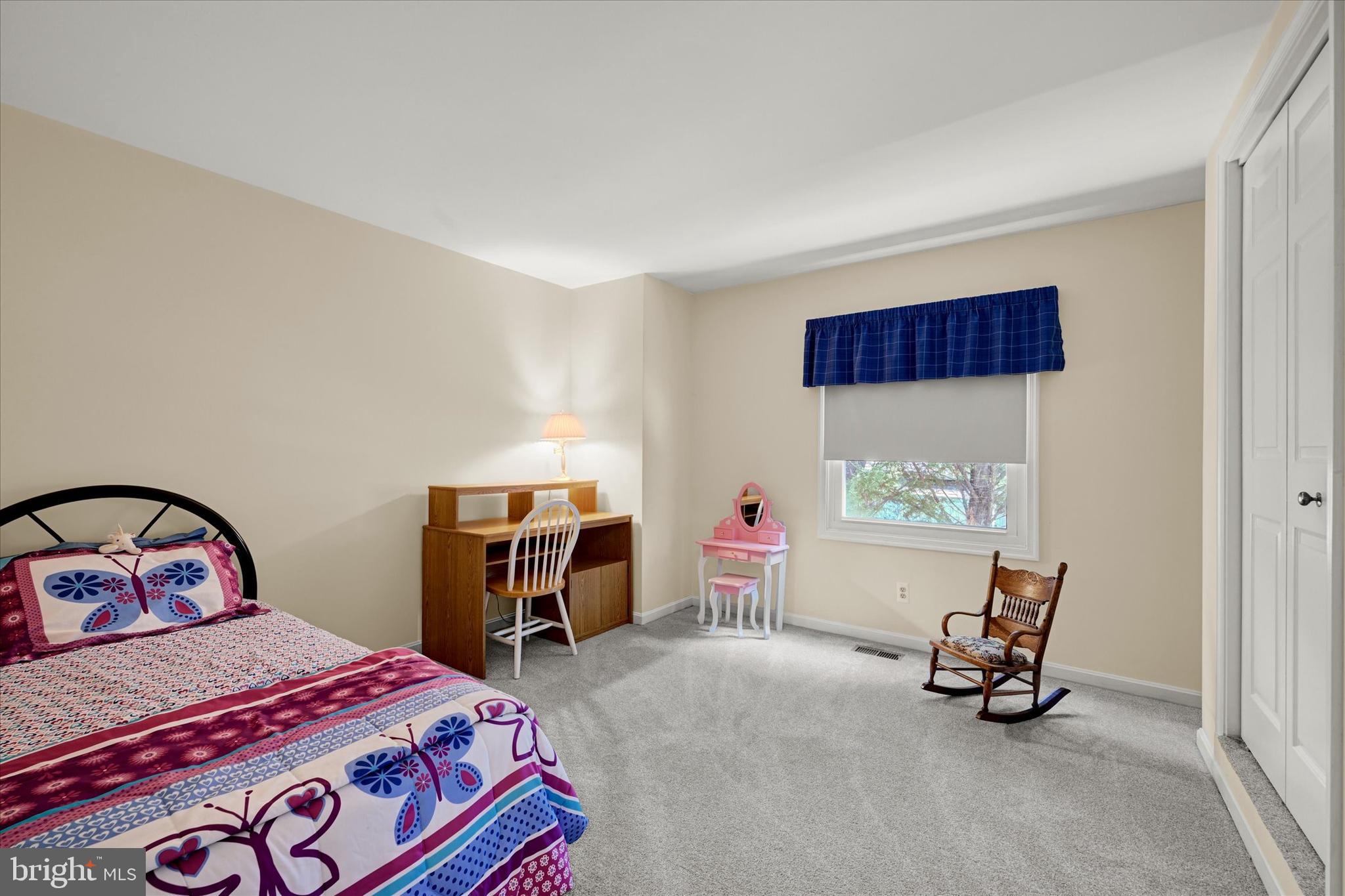 9006 Naygall Road Baltimore, MD 21234 - Photo 24 of 34 a bedroom with a bed a couch and dresser