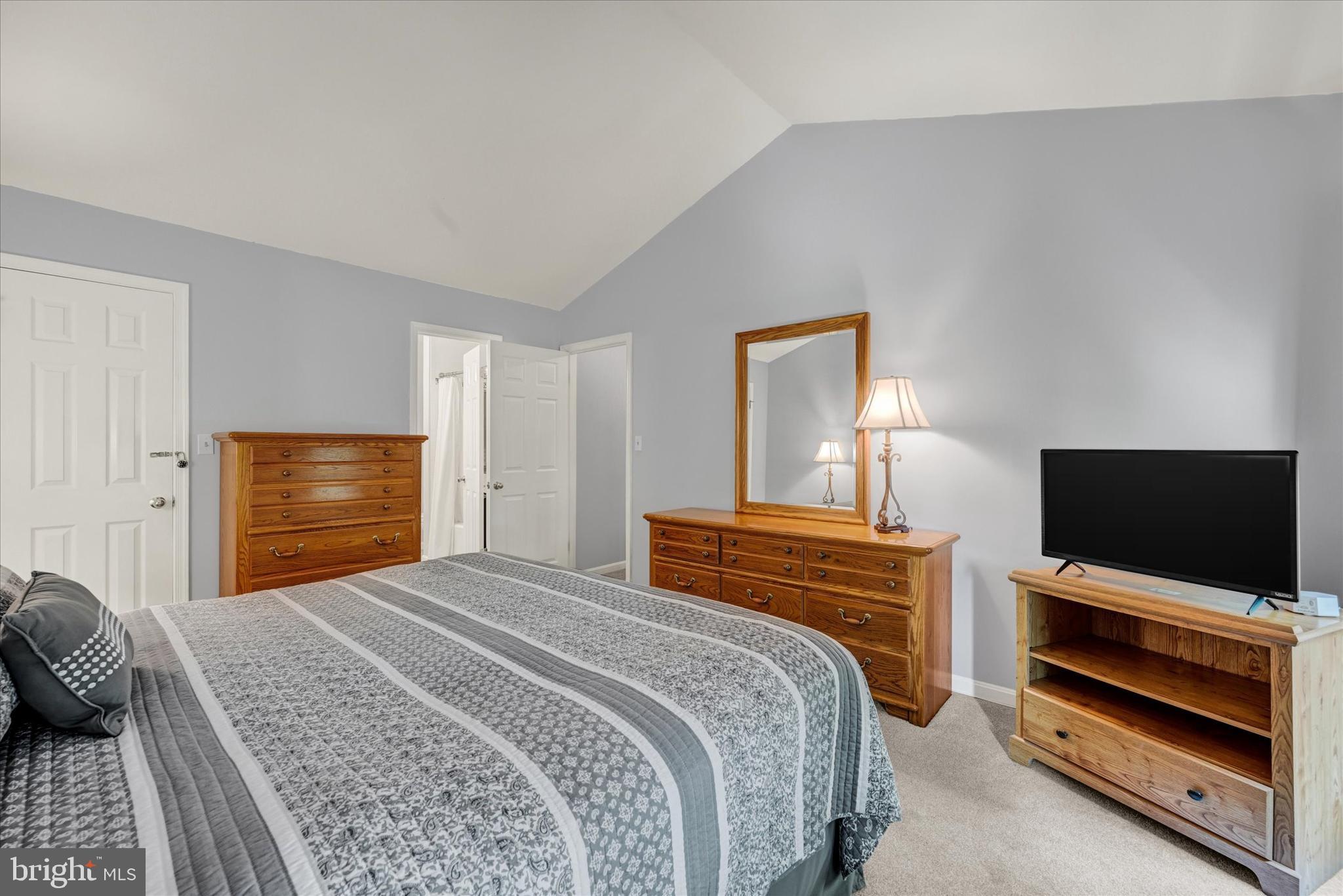 9006 Naygall Road Baltimore, MD 21234 - Photo 27 of 34 a bedroom with a bed and a flat screen tv