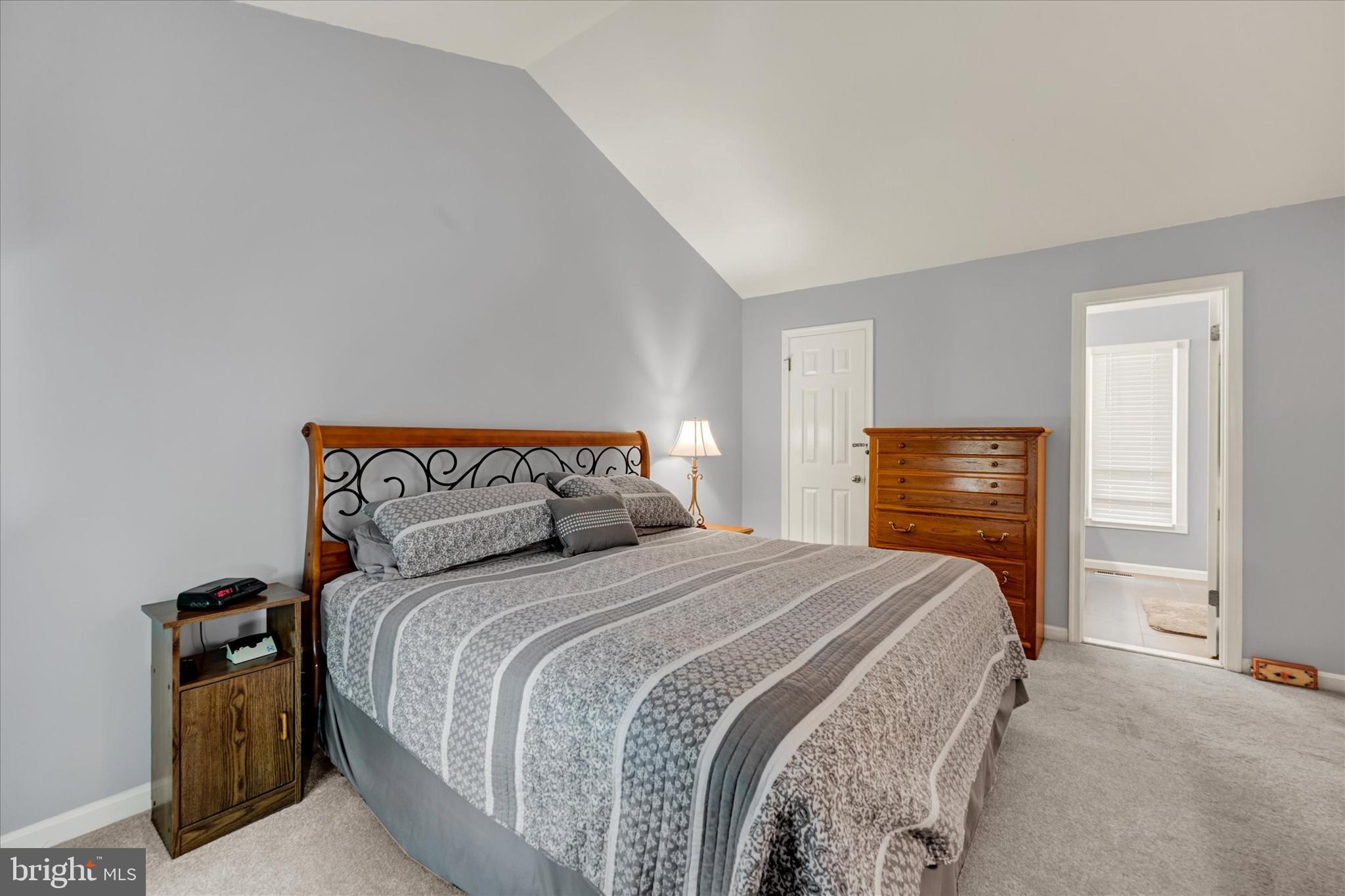 9006 Naygall Road Baltimore, MD 21234 - Photo 28 of 34 a bedroom with a bed and a tv