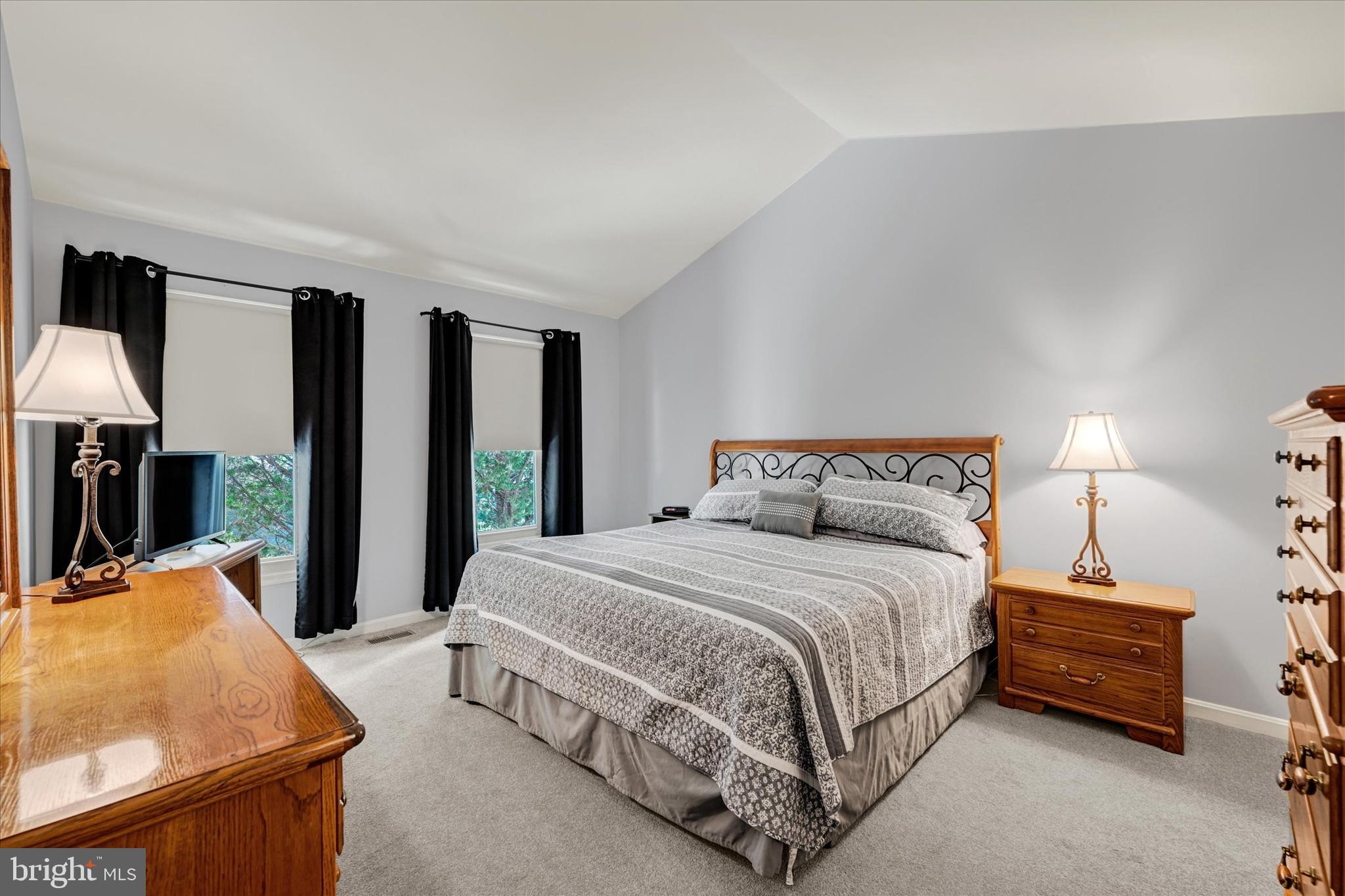 9006 Naygall Road Baltimore, MD 21234 - Photo 29 of 34 a bedroom with a bed and large windows